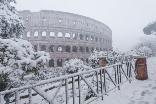 Snow storm in Colosseum photowallpaper Scandiwall