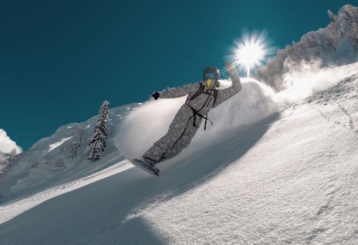 Picture of Snowboarder rides in cloud of powder snow