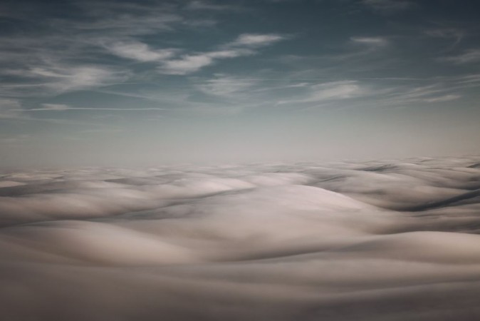 Above the Clouds photowallpaper Scandiwall