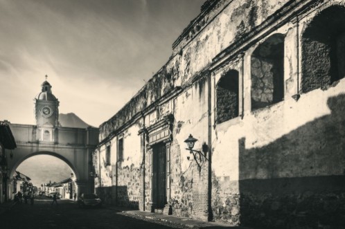 Image de Vintage look of Santa Catalina Arch with a heritage ruin on the right and Agua Volcano in the background