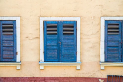 Image de Closed windows with old blue shutters Part of the facade of the building in the old town Riga Latvia
