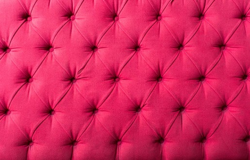 Afbeeldingen van Pink textile with buttons