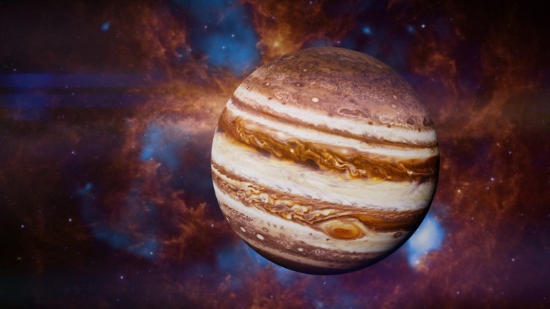 Planet Jupiter in front of a beautiful space nebula photowallpaper Scandiwall