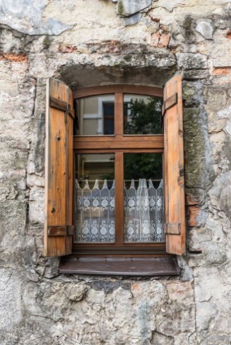 Image de Old window on ancient wall