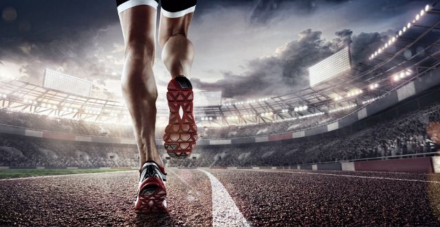 Afbeeldingen van Sports background Runner feet running on stadium closeup on shoe Dramatic picture