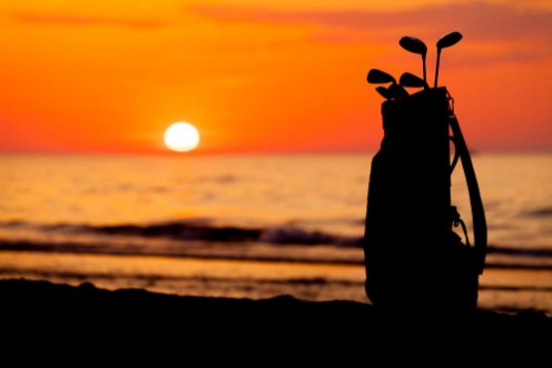 Idyllic shot of sunset and golf clubs photowallpaper Scandiwall