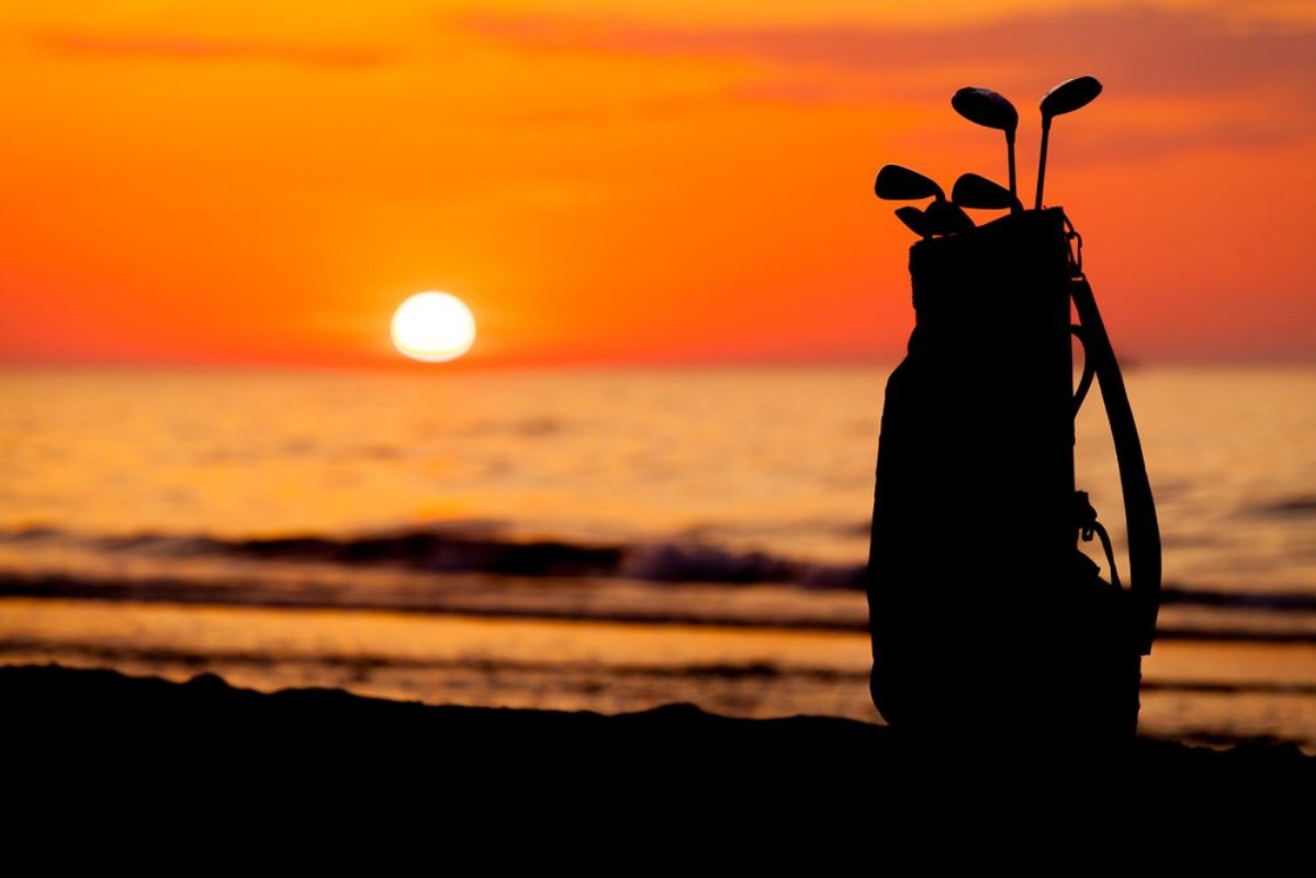 Picture of Idyllic shot of sunset and golf clubs