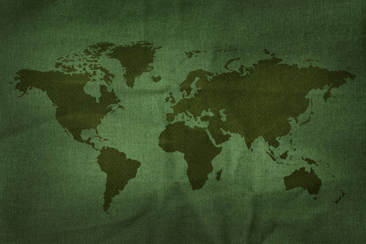 Afbeeldingen van World Map on Military Army Fabric Texture background