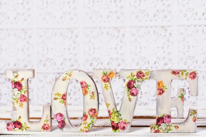Picture of Love background with decoupage decorated letters with rose pattern