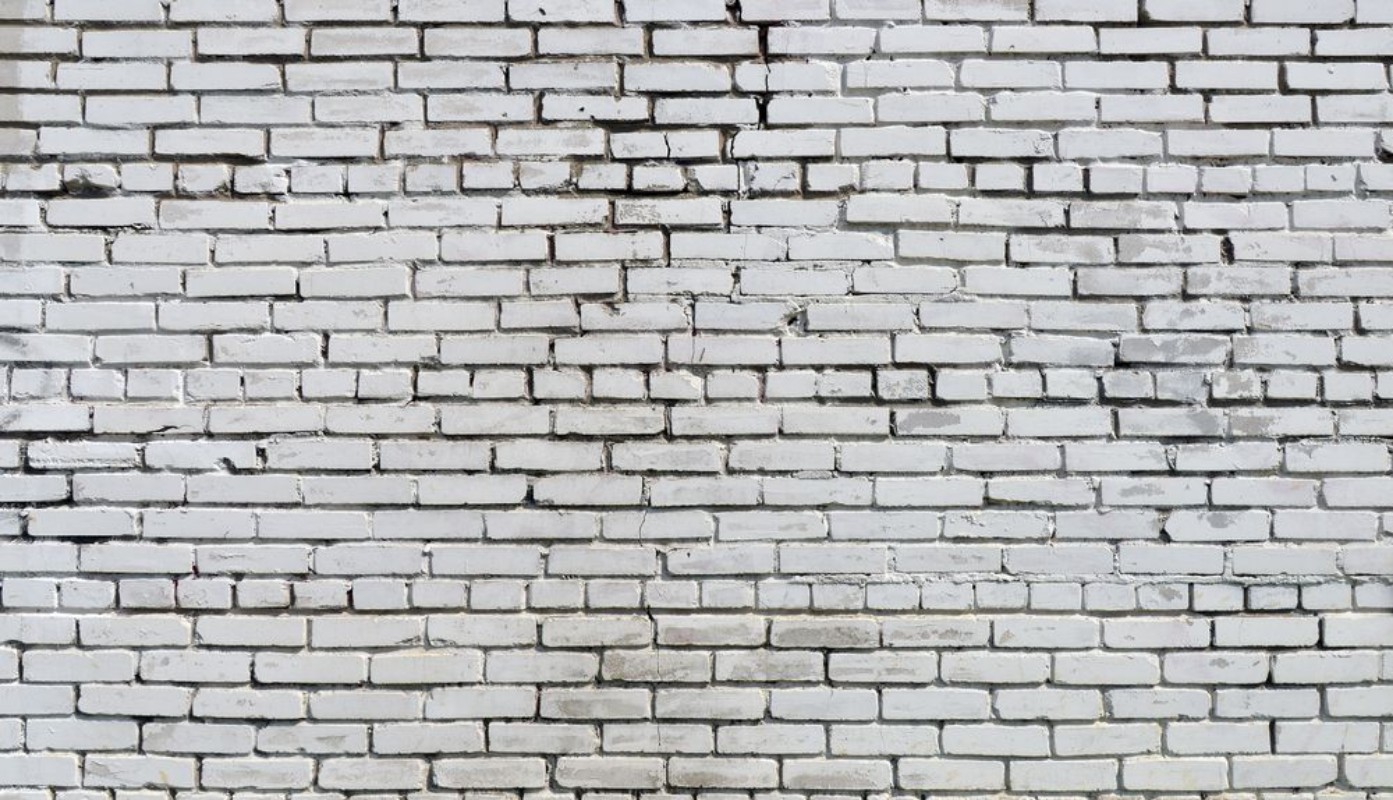 Bild på Brick wall painted with white paint