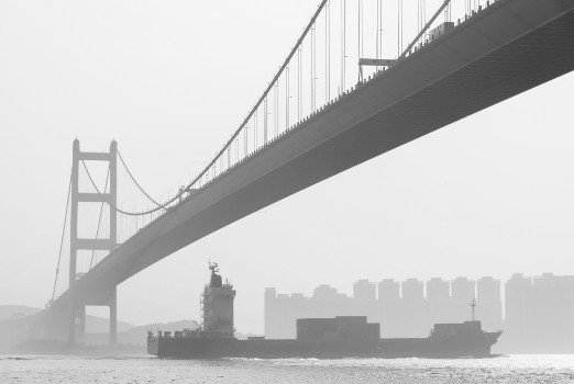 Picture of Cargo ship and Tsing Ma Bridge in Hong Kong