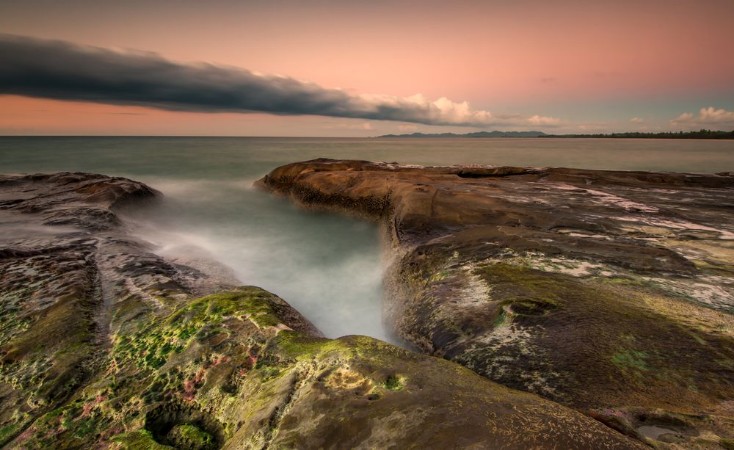 Picture of Long exposure sunset seascape at Kudat Malaysia Image contain soft focus due to long exposure
