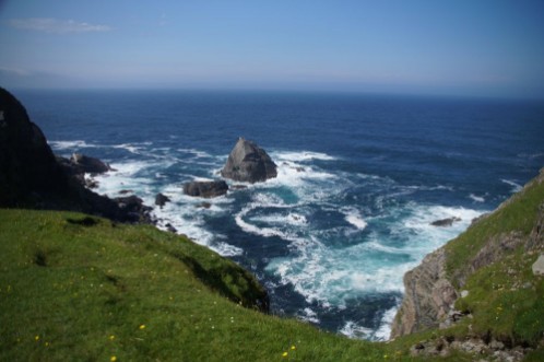 Afbeeldingen van Coast in Scotland with spray and rocks