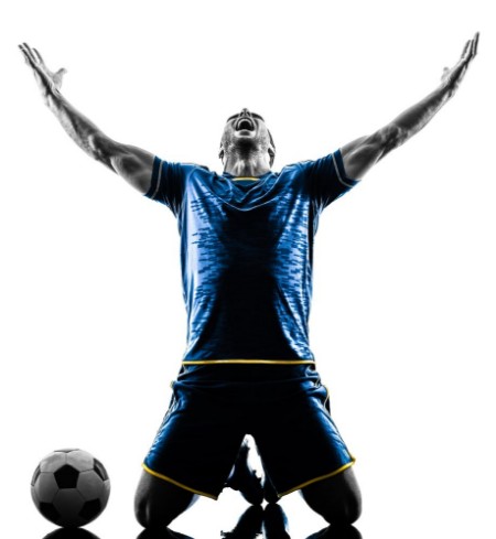 Bild på One caucasian soccer player man happy celebration  in silhouette isolated on white background