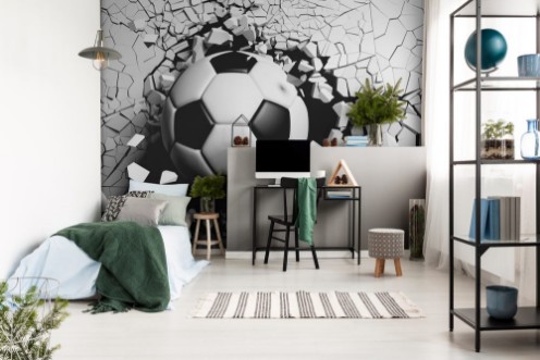 Picture of Soccer ball breaking forcibly through a white wall 3d illustration