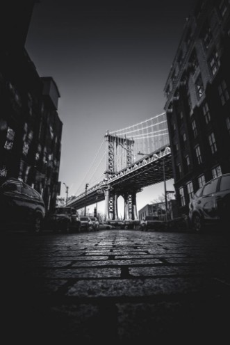 Bild på New York City Brooklyn Uno scorcio sul Manhattan Bridge che richiama i film pi classici come Cera una volta in America