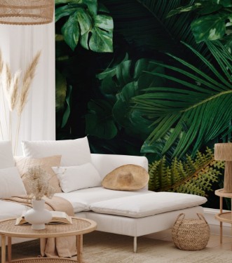 Bild på Creative layout made of tropical leaves Flat lay Nature concept