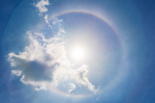 Bild på Sun halo in blue sky with cloud Dream miracle and amazing nature background
