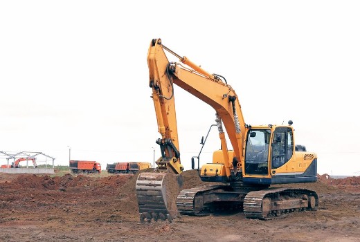 Picture of Crawler excavator at a construction site Building Excavator Close