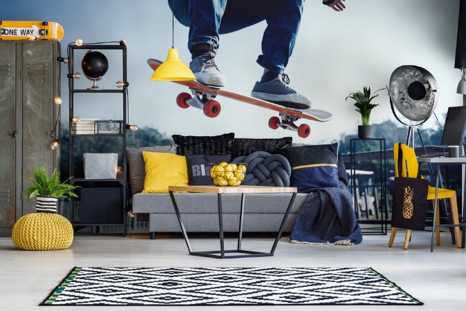 Picture of Skateboarder skateboarding at skatepark ramp