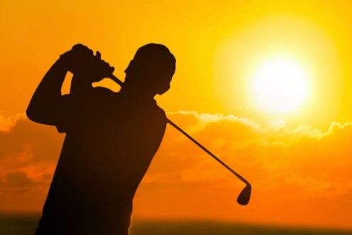 Image de Photo of a Golfer in  Sunset