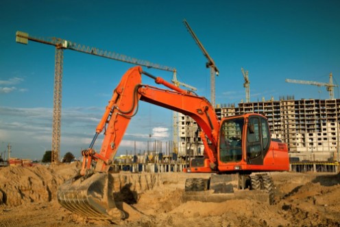 Afbeeldingen van Excavator on construction site