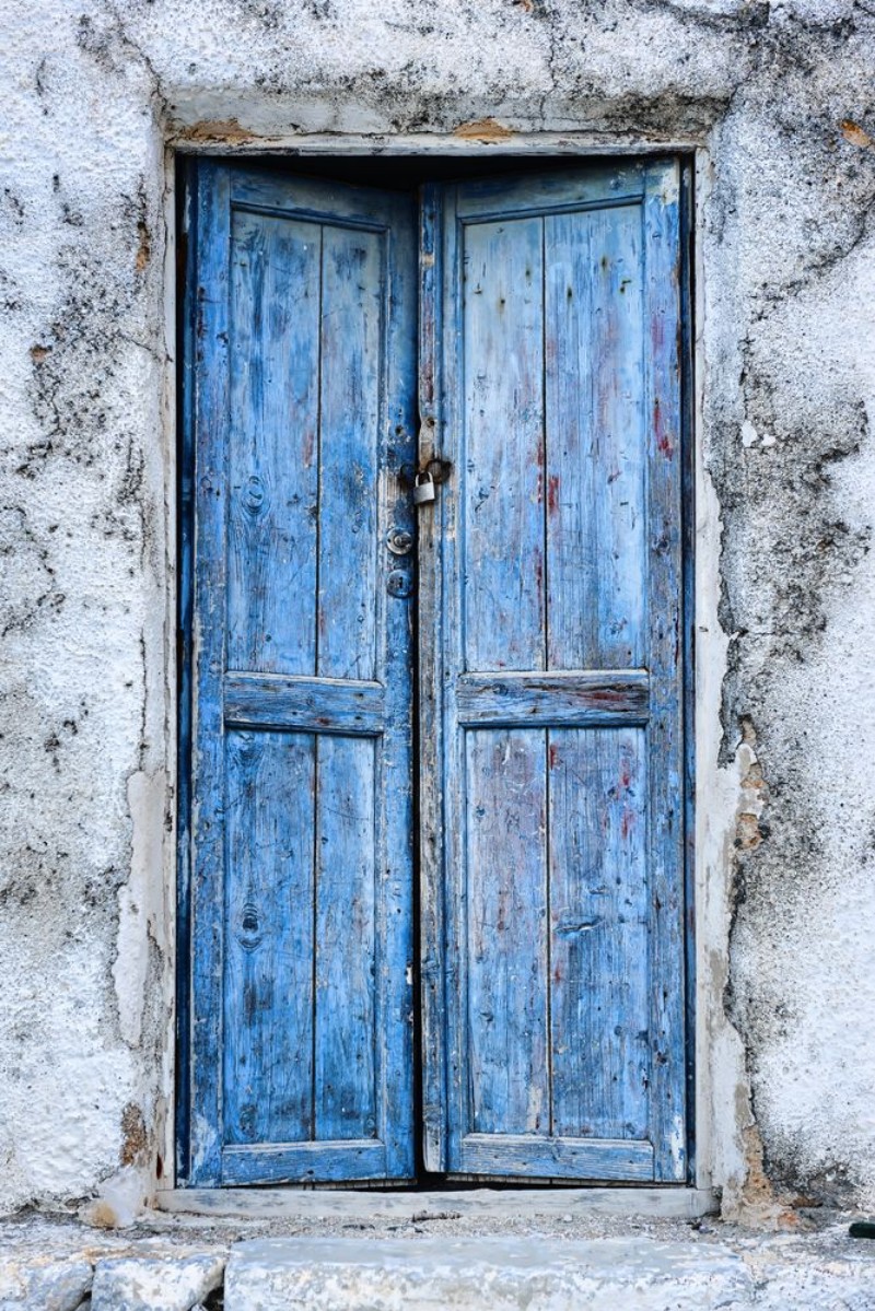 Picture of Old weathered blue door in Perissa