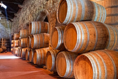 Bild på Cellar with wine barrels 