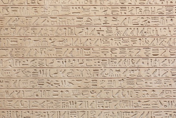 Picture of Egyptian hieroglyphs stone background