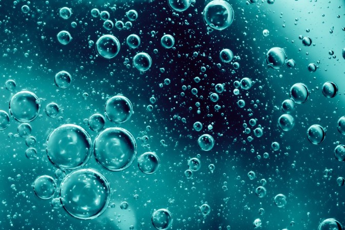 Water air and oil mixed for a bubbly effect photowallpaper Scandiwall
