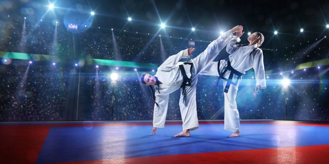 Afbeeldingen van Two professional female karate fighters are fighting