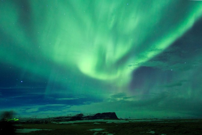 Islanda laurora boreale senza parole photowallpaper Scandiwall