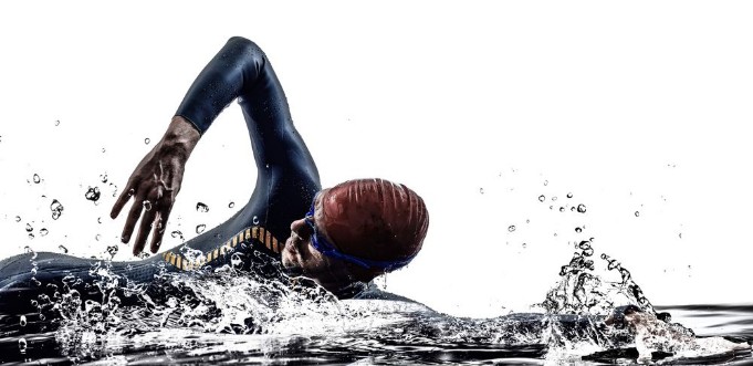 Afbeeldingen van Man triathlon iron man athlete swimmers swimming