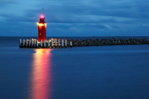Bild på Hou lighthouse at the blue hour in Denmark