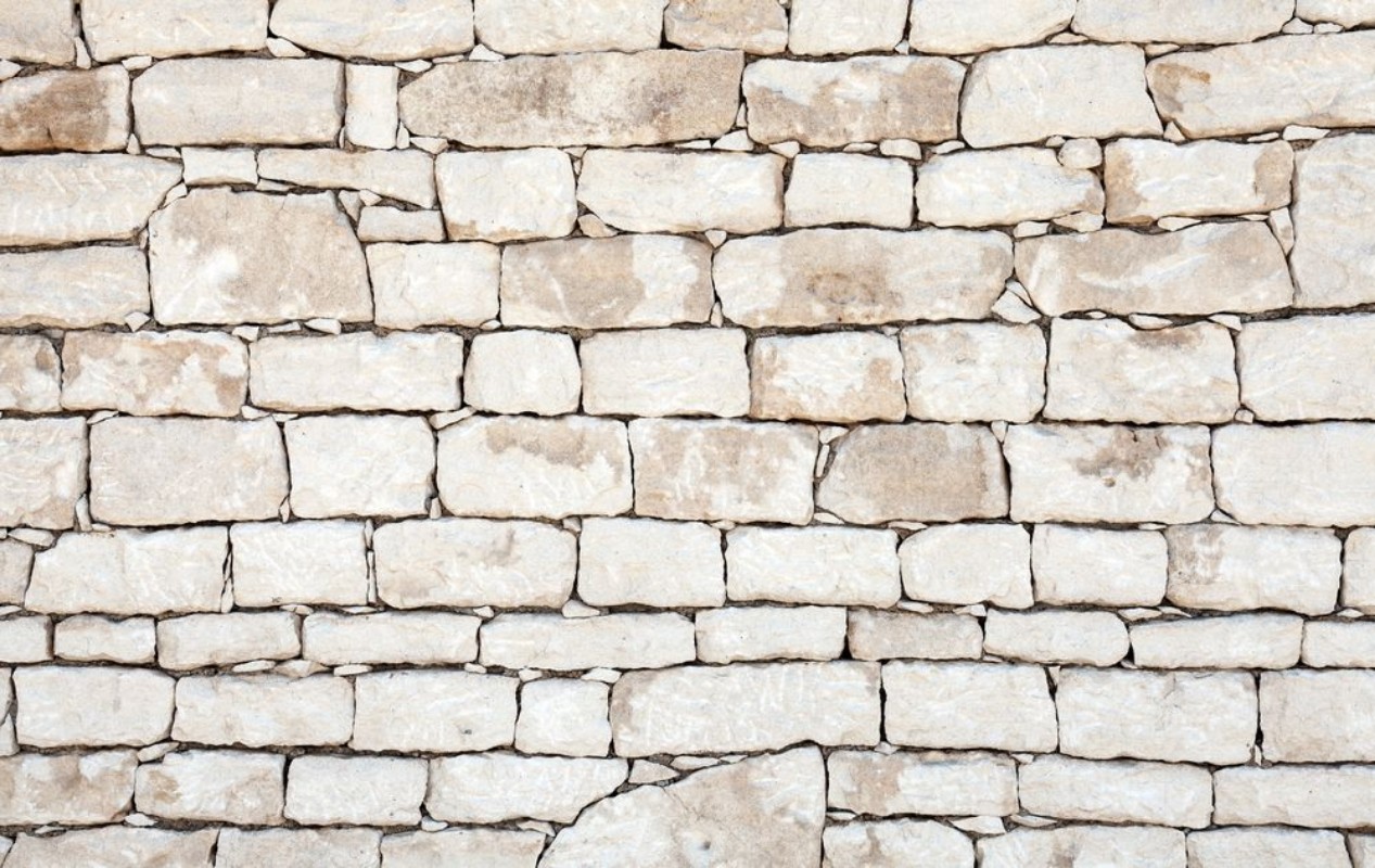 Afbeeldingen van Old stone wall detailed background texture