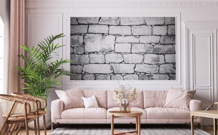 Afbeeldingen van Old white stone wall detailed background