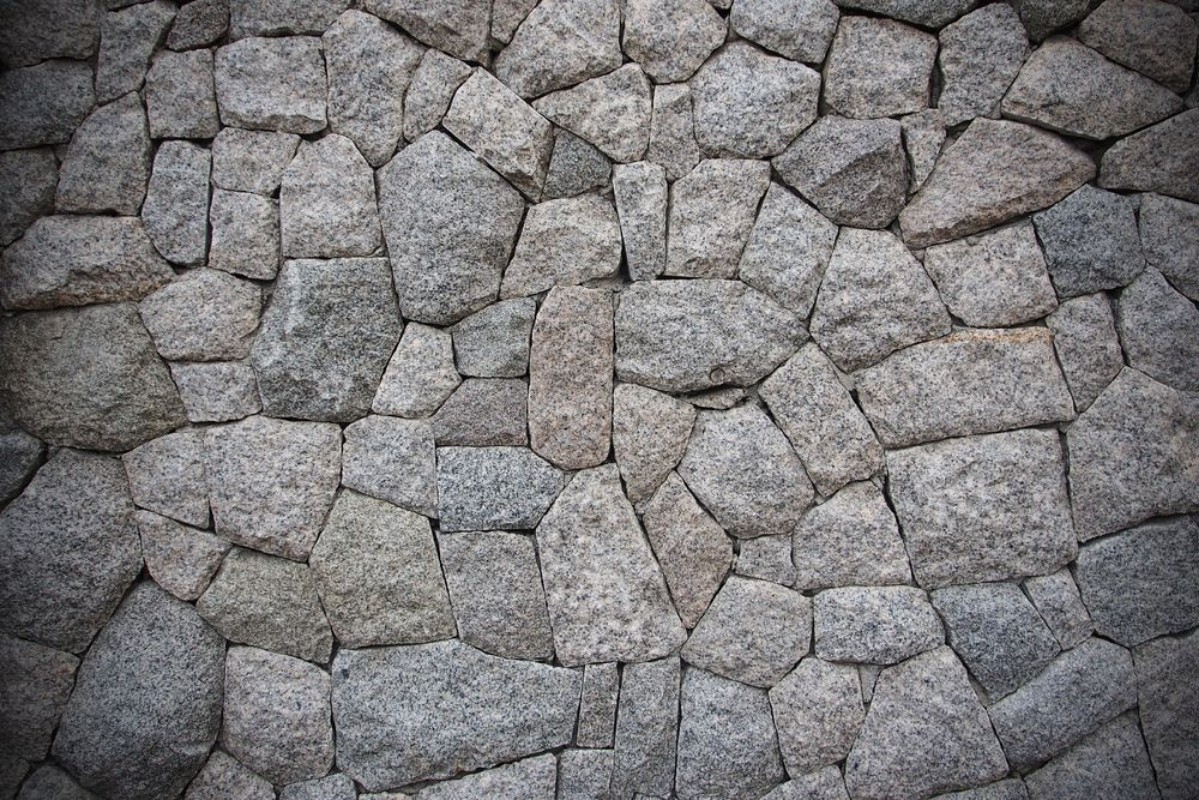 Afbeeldingen van Old stone wall texture for background
