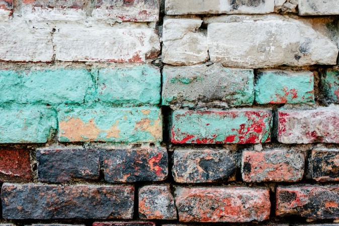Picture of Texture Brick Wall A background with attritions and cracks