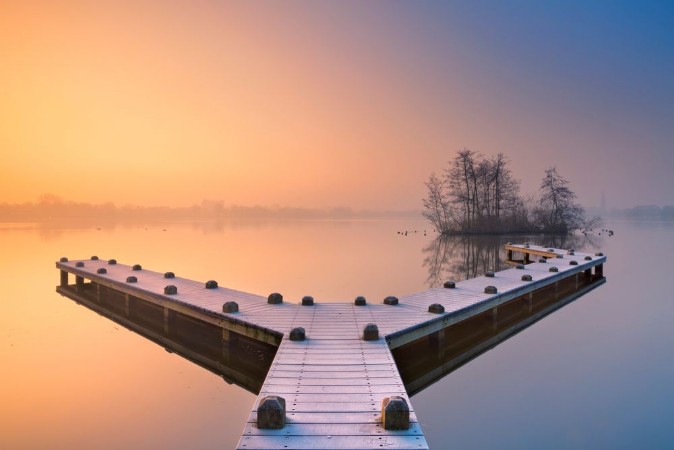 Picture of Jetty on a still lake on a foggy winters morning