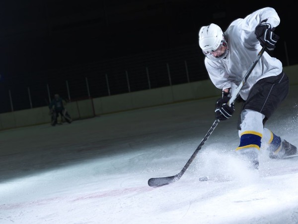 Afbeeldingen van Ice hockey player in action