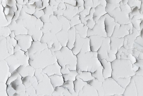Picture of Cracked flaking white paint background texture