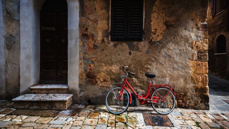 Picture of Abandoned bike on the Italian street in the old Tuscany