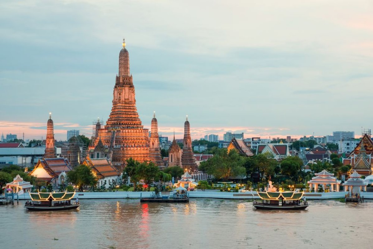 Picture of Wat Arun and cruise ship in night Bangkok city Thailand