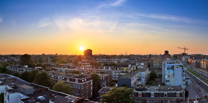 Bild på Amsterdam cityscape sunset skyline