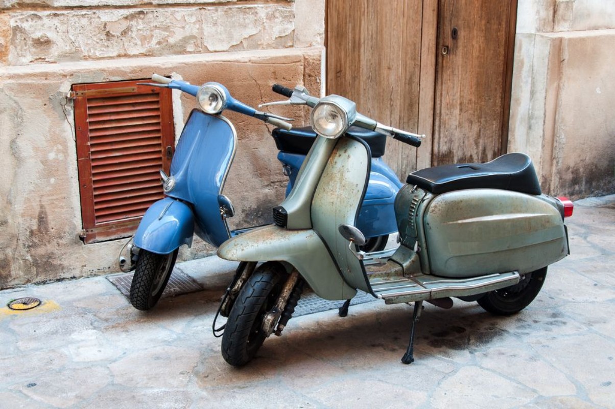 Picture of Two vintage scooter parked in the street